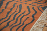 Vintage Indian Kilim with terracotta and dusty teal tiger stripe pattern, intact fringe.