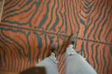 Vintage Tiger Kilim rug featuring dramatic rust and teal charcoal abrashes.