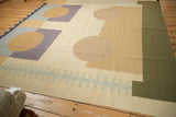 Abstract Contemporary Kilim with circles, blocks, and zipper design in beige, sand, and olive green.
