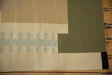 Contemporary Kilim rug featuring abstract geometric blocks and pale blue zipper design.
