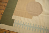 Abstract contemporary Kilim with olive green geometric block and pale blue zipper motif.