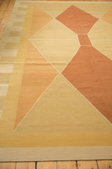 Modern contemporary Kilim carpet, showcasing beige, sand, and pale copper argyle diamond pattern.