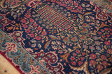 Intricate millefleur floral design on a navy Persian Kerman runner with fleur-de-lis border.