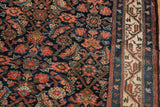Dense Herati motif in navy, blush, saffron, and ivory Mir Serbend border.