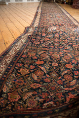 Intricate Herati motif and Mir Serbend border in navy, saffron, and ivory on a Hamadan runner.