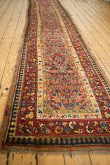 Lengthwise view of an antique Persian Serab runner with its intricate, naturally dyed floral borders.
