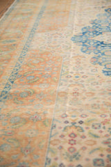 Angled detail of the distressed vintage carpet showing even wear to the knot heads.