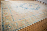 Angled view of the vintage Bulgarian carpet highlighting its soft, worn pile and full length.