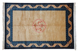 Vintage Peking carpet, dragon medallion on pale gold field, cobalt blue multi-dragon borders, 6x9.