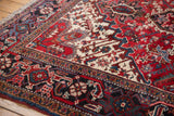 Plush, full pile and meandering turtle design border on a vintage Persian Mehrivan carpet.
