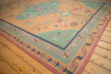 Geometric design elements and hook-and-latch outlines on this vintage stone wash Dhurrie.