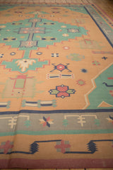 Vintage Stone Wash Dhurrie rug with geometric patterns in dusty gold and pale turquoise.