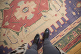 Stone Wash Dhurrie rug section with dusty raspberry, faded blue, mallard green, ivory motifs.