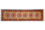 Vintage hand-knotted Siberian Kazak runner with starburst medallions, geometric field, saffron, red, navy.