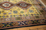 Vintage Siberian Caucasian rug's dark blue geometric border, colorful square motifs, and intact selvage.