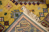 Tight, hand-knotted back of the Siberian carpet, with its ivory fringe and blue selvage.