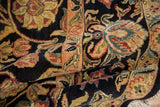 Full pile vintage Indian Arts and Crafts carpet, detailed gold, red, and sage palmettes.