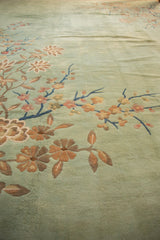 Vintage Japanese Art Deco carpet with plush seafoam green pile and ornate foliage.