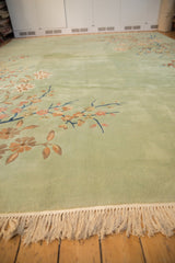 Plush cream fringe and neatly secured end of the vintage Japanese Art Deco carpet.