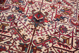Detailed view of the vintage Mehrivan runner's geometric floral palmettes and full wool pile.