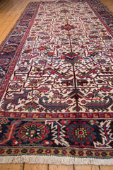 Full length view of a vintage Mehrivan runner highlighting the allover floral palmette design.