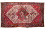 Vintage Mehrivan carpet with a large red and blue medallion on an ivory leaf-lattice field.