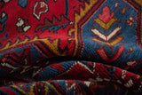Richly textured, even wool pile of a vintage Persian Mehrivan rug in sapphire blue and gold.