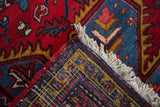 Hand-knotted foundation and original side cord selvage of a vintage Persian Mehrivan carpet.