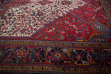 Evenly woven pile and detailed serrated leaf motif on a vintage Persian Mehrivan carpet.