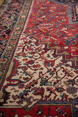 Vintage Mehrivan carpet detail with serrated leaves, palmettes, and Samovar border in red, ivory, and navy.