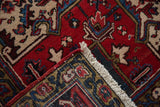 Vintage Mehrivan carpet: cream fringe, red selvage, and navy turtle motif border.