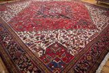 Angled perspective across the plush wool pile of a vintage Mehrivan carpet's geometric design.