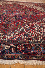 Angled view highlighting the full, plush pile and geometric design of a Persian Mehrivan rug.