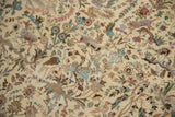 Detailed hand-knotted pheasants and deer in mauve and powder blue on a vintage Tabriz carpet.