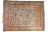 Vintage Tabriz rug with a delicate scalloped medallion and floral design in powder blue, ivory, and beige.