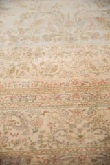 Soft, full pile of a vintage Tabriz carpet showing intricate floral sprays and buds.