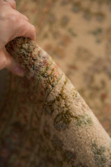 A detailed view of the vintage Tabriz carpet's plush, like-new, full wool pile.