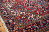 Plush, full pile and intricate turtle design border on a vintage Persian Mehrivan carpet corner.