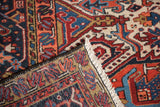 Fringe and tightly hand-knotted foundation of the vintage Heriz carpet.