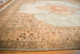 Vintage Tabriz carpet with an abrashed powder blue field and ornate beige floral spandrel.
