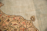 Vintage Tabriz carpet spandrel with scrolling floral tendrils and powder blue abrash.
