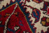 Close-up view of the plush, like-new pile on a hand-knotted Persian Mehrivan carpet.