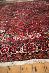 Angled view showing the sharp contours and full pile of a vintage Heriz carpet.