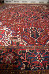 Expanse of a vintage Persian Ahar carpet showing its dense, Heriz-style design and full pile.