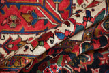The full wool pile and brilliant gem-tone shades of a vintage hand-knotted Ahar carpet.