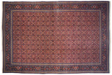 Finely woven vintage Tabriz carpet with a red Herati field and wide sapphire blue turtle motif border.