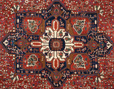Close view of the refined central medallion on a vintage Karaja rug with gem-tone geometric detailing.