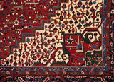 Finely knotted pile of a vintage Karaja showing a stepped medallion corner in ruby and sapphire blue.