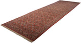 The allover Herati motif viewed down the length of a vintage brick red Tabriz runner.