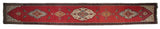 Antique Armenian Karabagh runner with pictorial birds flanking a central column of medallions.
